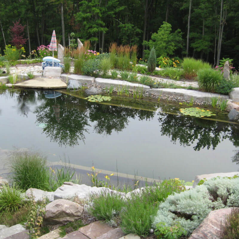 Large residential pond construction mi 2